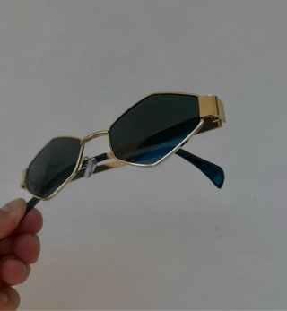 Occhiali da sole oro e neri