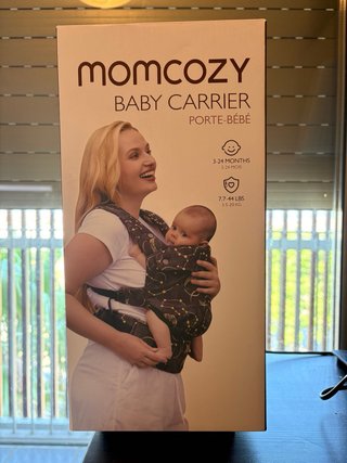 Mochila Porta Bebé Momcozy transpirable