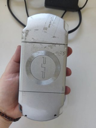 Sony PSP Plata + Cargador + Juego