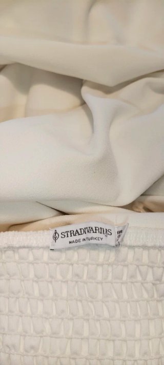 Top blanco con cortes