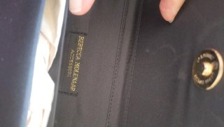 Bolso de fiesta negro con cadena dorada