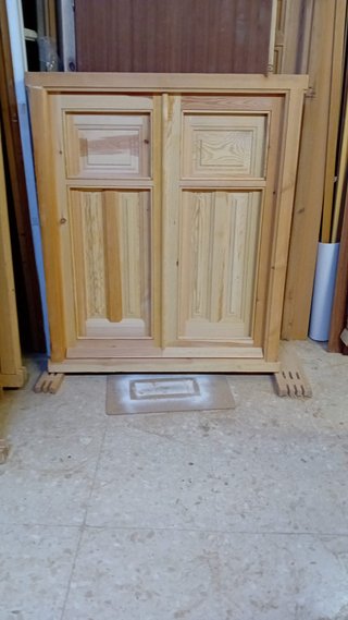 Ventanas de madera con postigos