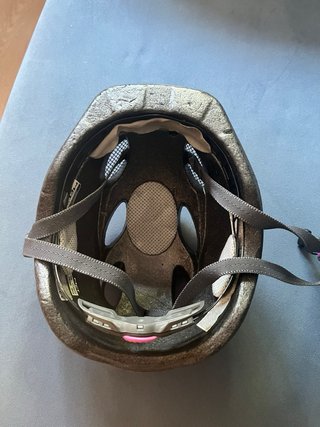 Casco MET infantil rosa con dibujos