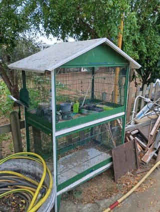Jaula para pájaros de dos niveles