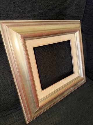 Marco de madera dorado y plateado