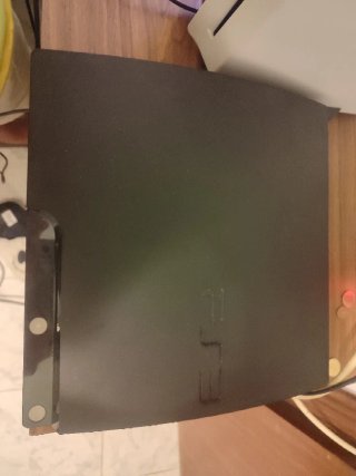 Ps3 slim + 10 juegos físicos + 2 mandos