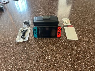 Kit Nintendo Switch + 3 Juegos