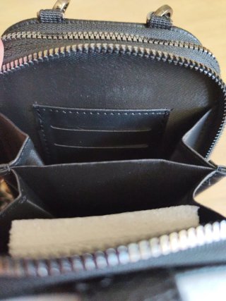Bolso cartera negro con correa multicolor