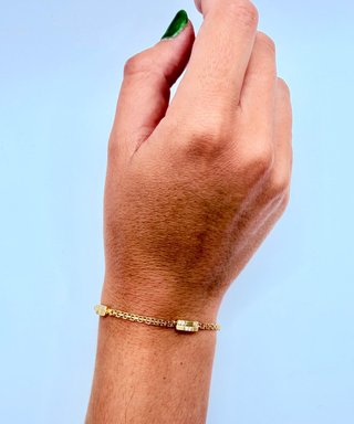 PULSERA CON PIEDRAS BLANCAS ORO 18k. Peso 3,46g