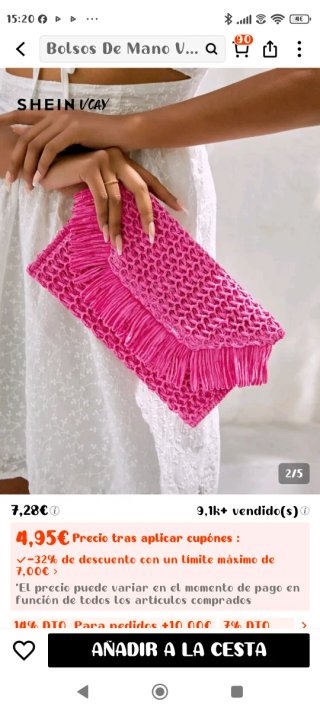 Cartera de mano rosa con flecos