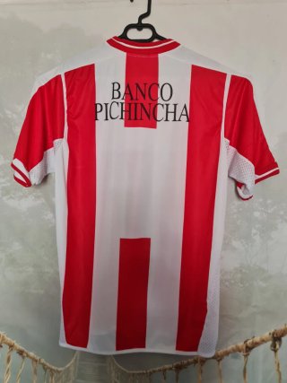 Camiseta deportiva Optimus roja y blanca