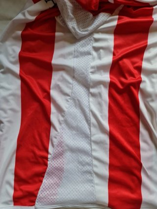 Camiseta deportiva Optimus roja y blanca