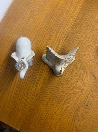 Figure di elefante e pavone