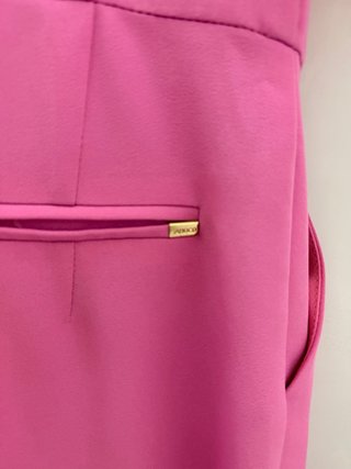 Mono Sahoco rosa fucsia botones dorados T.M
