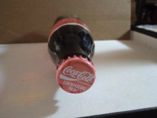 Coca Cola Lotto 4 bottiglie e 1 lattina anni 80-90