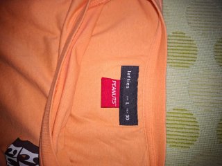 Camiseta naranja manga larga con estampado