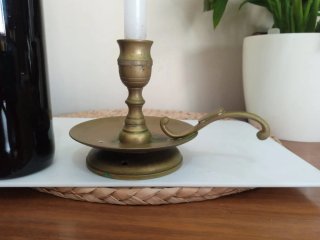 Antiguo candelabro porta velas o palmatoria.