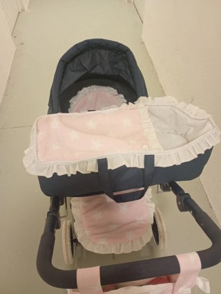 Carrito de muñecas azul y rosa