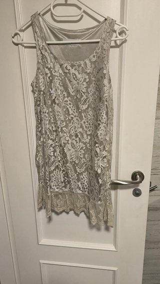 Vestido tipo americana. Chalecos y blusas
