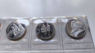 Lote con monedas y medallas varias
