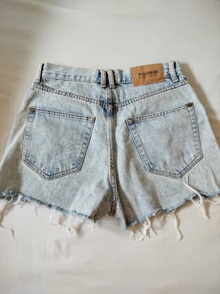 Vaqueros cortos desgastados Mango y Pull