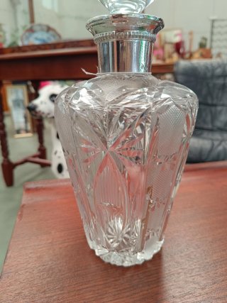 Botella licorera de cristal y plata