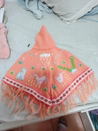 Poncho infantil tejido