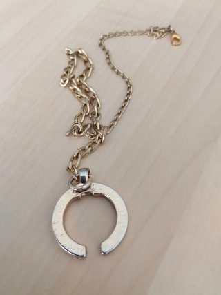 Abanico dorado con circonitas y cadena llueva enga