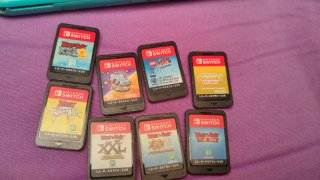 Nintendo Switch Lite + 8 Giochi