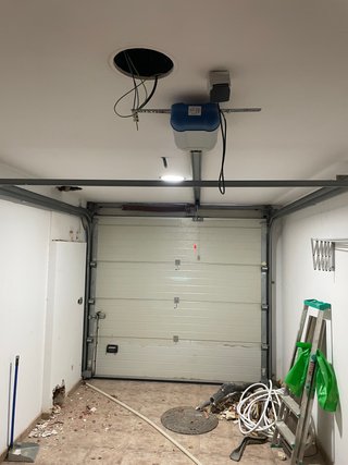 Puerta automática elevadora