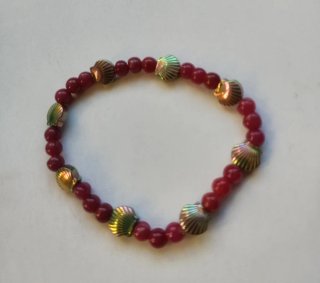Pulsera de Rubí indio con conchas de Hematite