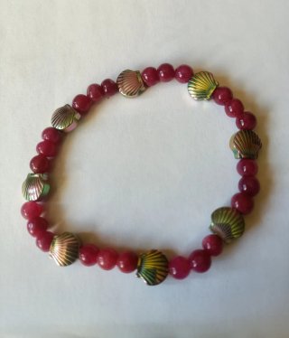Pulsera de Rubí indio con conchas de Hematite