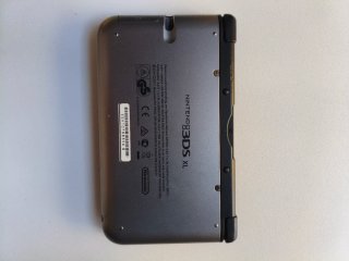 Nintendo 3DS XL + Cargador + Funda de metal