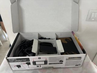 Nintendo Switch + Monster Hunter Rise + extras