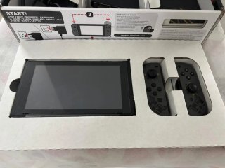 Nintendo Switch + Monster Hunter Rise + extras