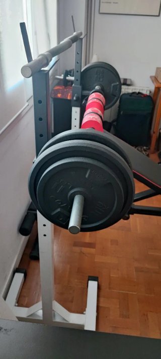 Rack de pesas, barra, discos, banco y mancuenas