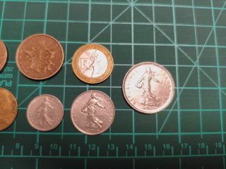 Lote de 10 monedas de francos franceses,siglo XX.2