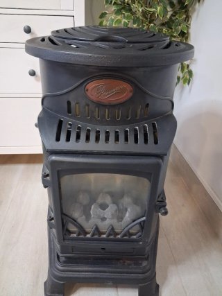 Estufa de gas butano vintage, recogida en persona