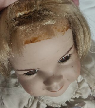 Bambola da collezione in porcellana vintage