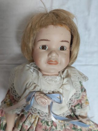 Bambola da collezione in porcellana vintage