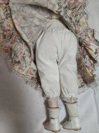 Bambola da collezione in porcellana vintage