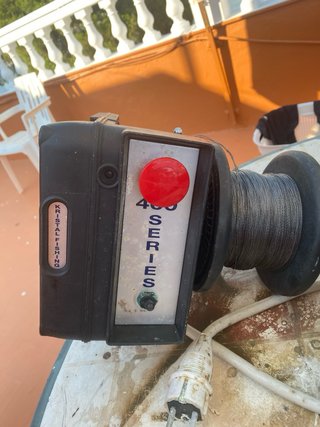 Carrete y cañas de fondo