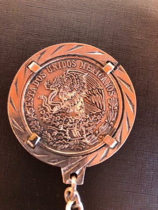 Moneda de 100 pesos Mexicanos en Plata.