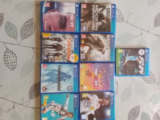 Ps4 Slim 1Tera + dos mandos originales  + 9 juegos
