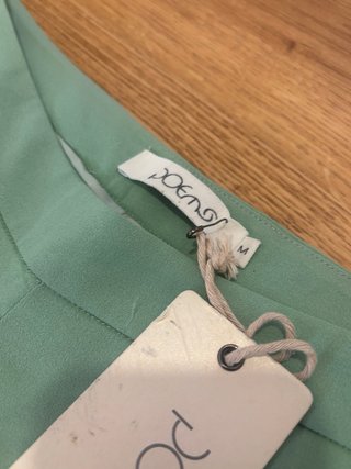 Pantalones poems con etiqueta