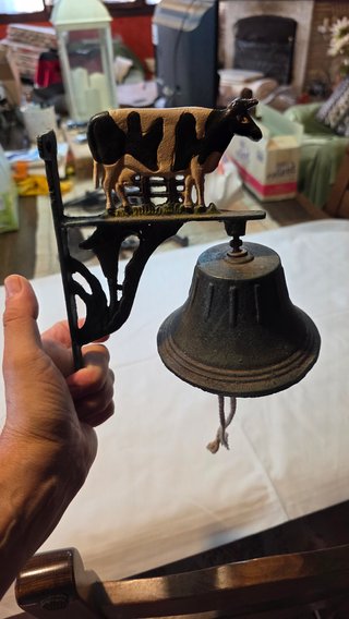 Supporto in metallo con campanella