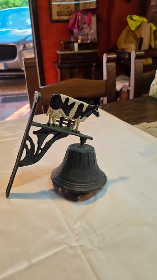Supporto in metallo con campanella