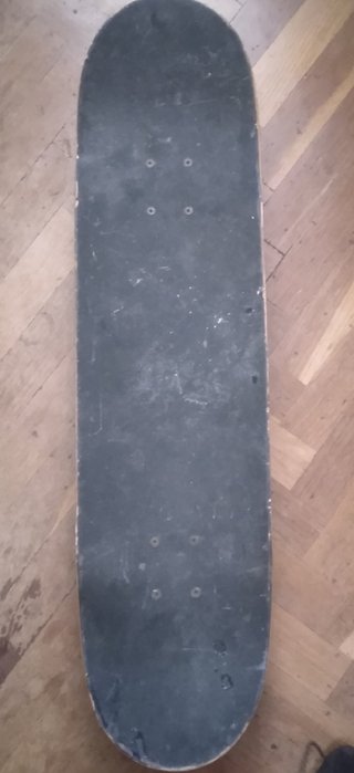 Tabla skate Oxelo y 4 Ruedas super Cruiser