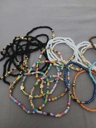 Set 10 braccialetti perline cuore oro