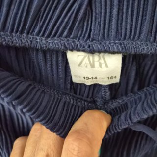 Pantalones plisados azul marino 14 años